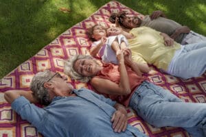 maintaining outdoor fabric - family on picnic blanket