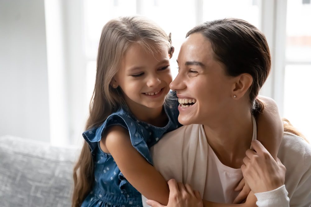smiling-mother-with-preschool-daughter