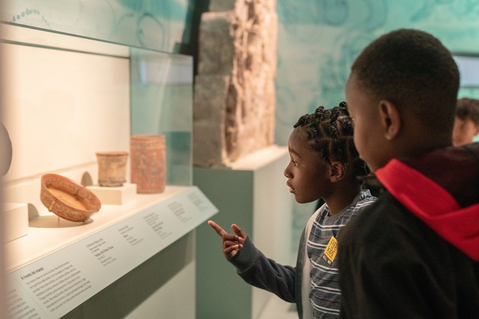 children looking at exhibit at Denver Art Museum