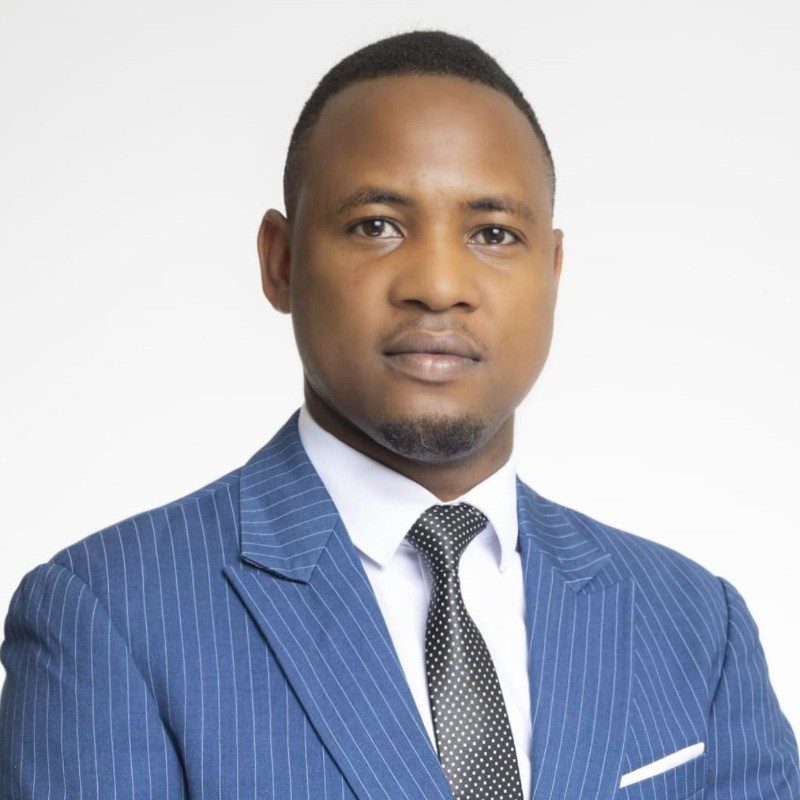Headshot of Dr. Abram Musinguzi