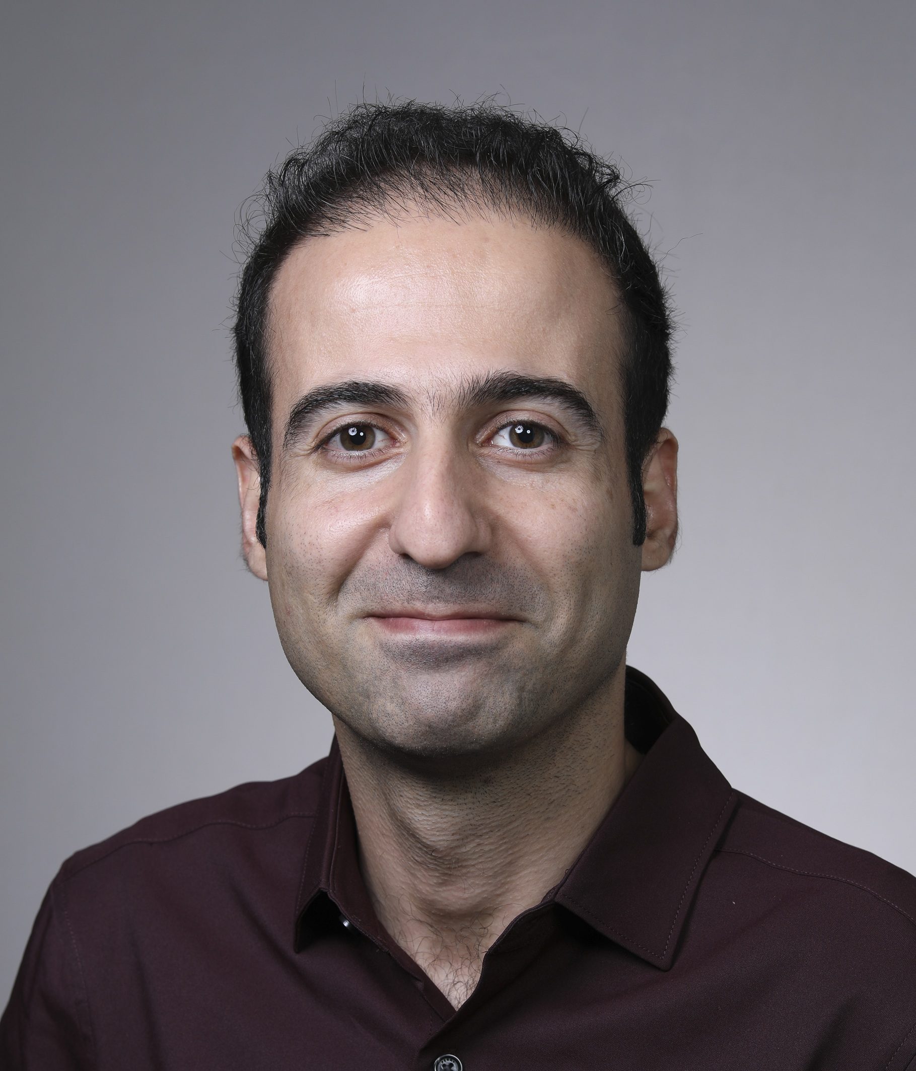 Headshot of Dr. Koorosh Azizi