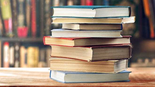 a stack of books on a table