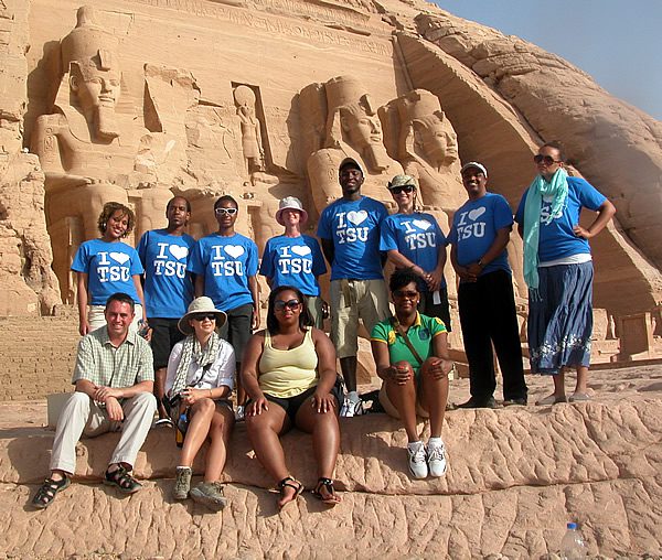 A group of people at an ancient Egyptian archeological site.